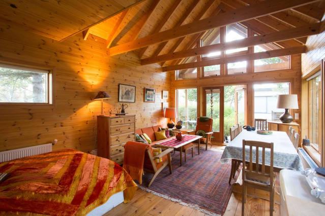 Tempat tidur dalam kamar di Beautiful Cottage in Hveragerdi