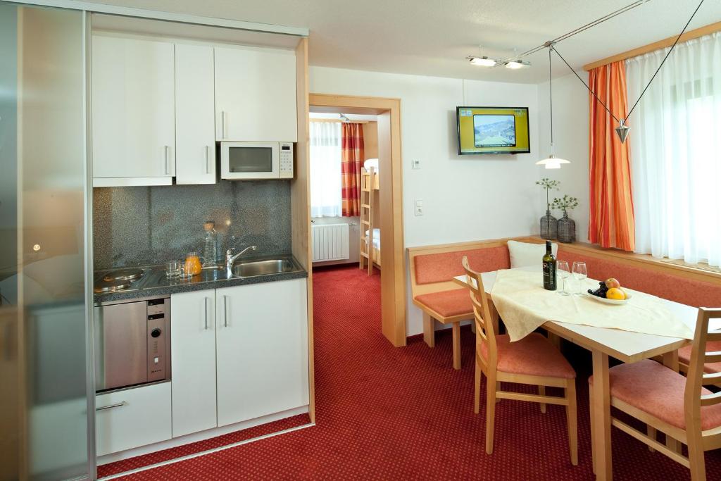 Kuchyň nebo kuchyňský kout v ubytování Aparthotel Brunnenhof