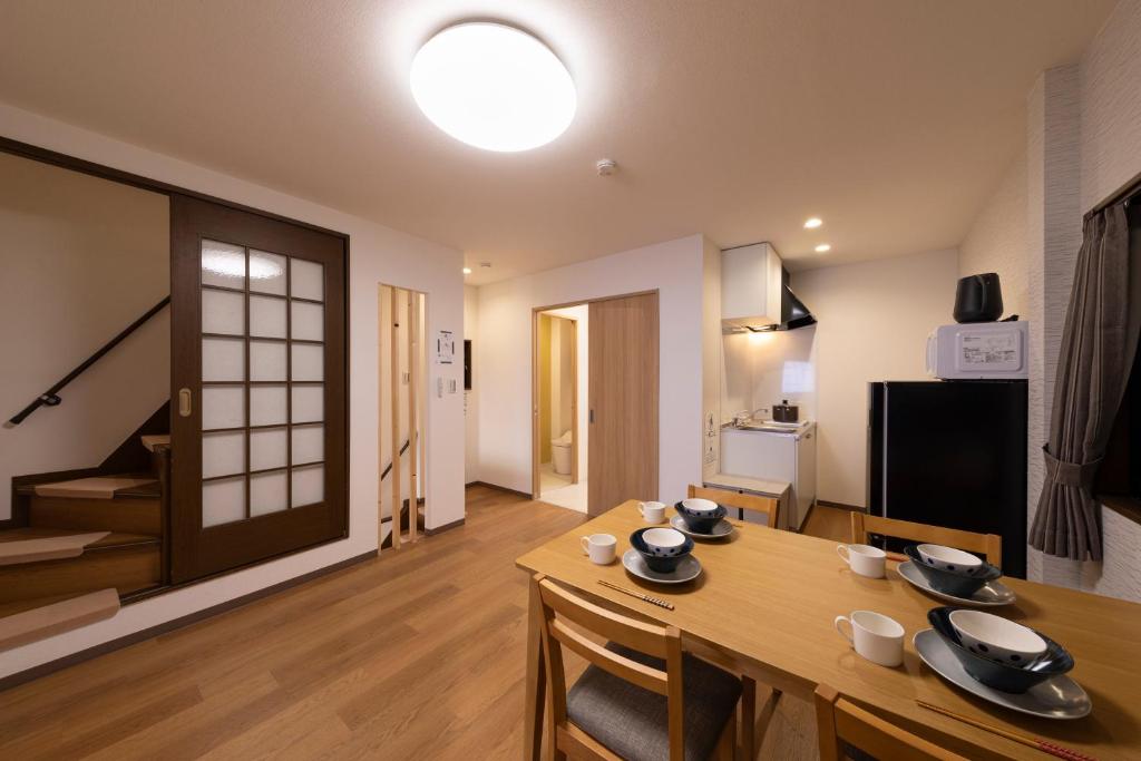 TV a/nebo společenská místnost v ubytování 青羽-橘山