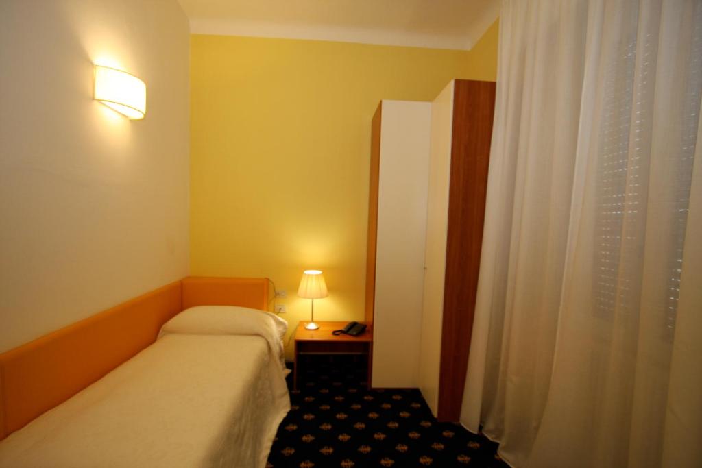 Postel nebo postele na pokoji v ubytování My Hotel Milano