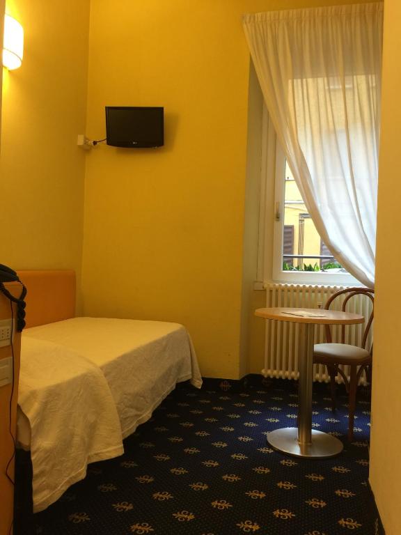Postel nebo postele na pokoji v ubytování My Hotel Milano