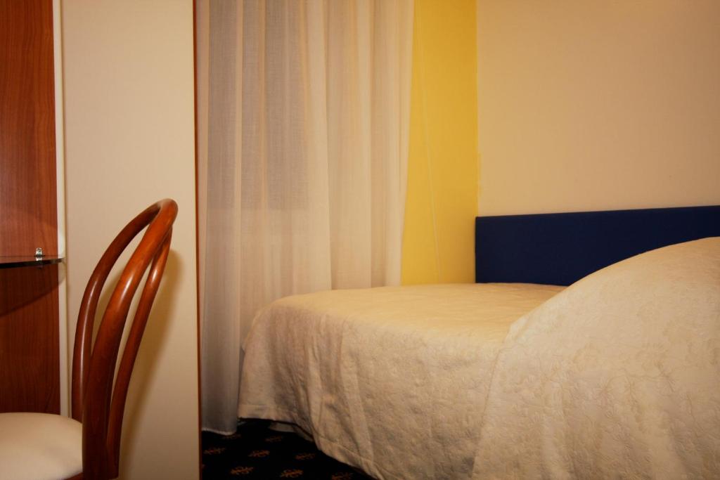 Postel nebo postele na pokoji v ubytování My Hotel Milano