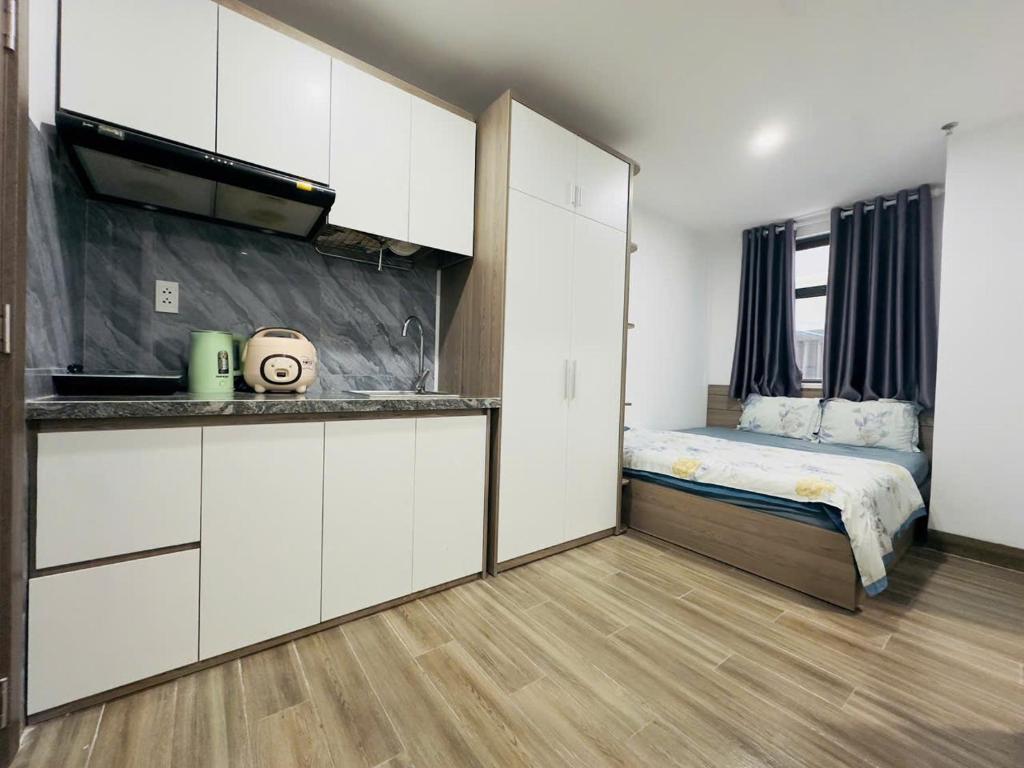 Postel nebo postele na pokoji v ubytování Hotel & Apartment Sentosa