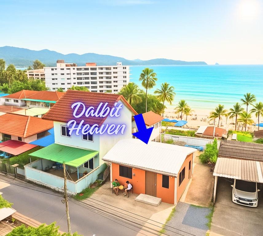 a building with a sign that reads dahi heaven next to the beach at Dalbit Heaven #Patong Beach 3 min walk Super Private House 2BR in Patong Beach