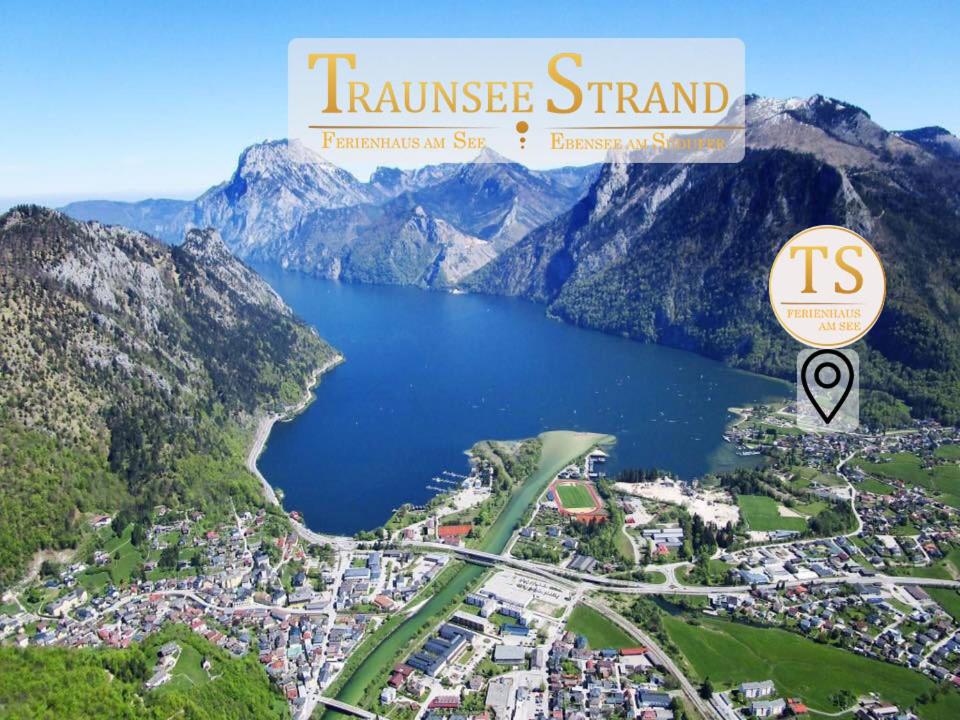 a view of a lake with mountains in the background at Ferienhaus TraunseeStrand in Ebensee