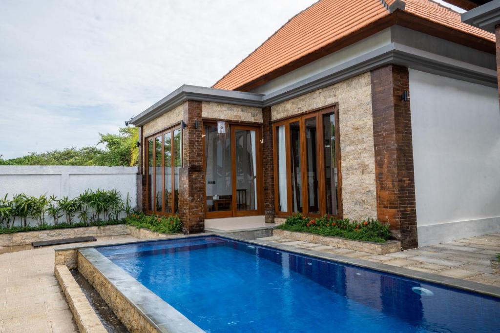 Πισίνα στο ή κοντά στο Ulu dawa Pandawa Cottage