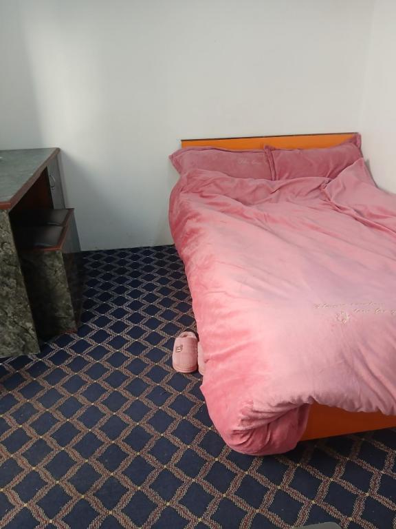 Postel nebo postele na pokoji v ubytování Nauni resort