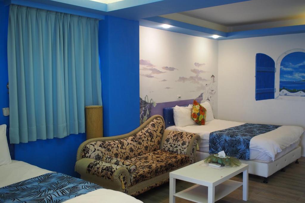 Postel nebo postele na pokoji v ubytování Shengtuolini B&B