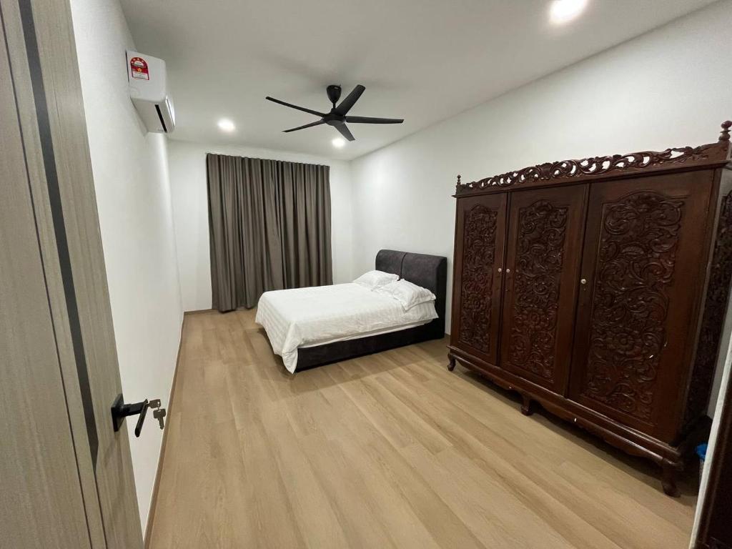 Postel nebo postele na pokoji v ubytování CasaD'Tamarind Homestay with Private Pool