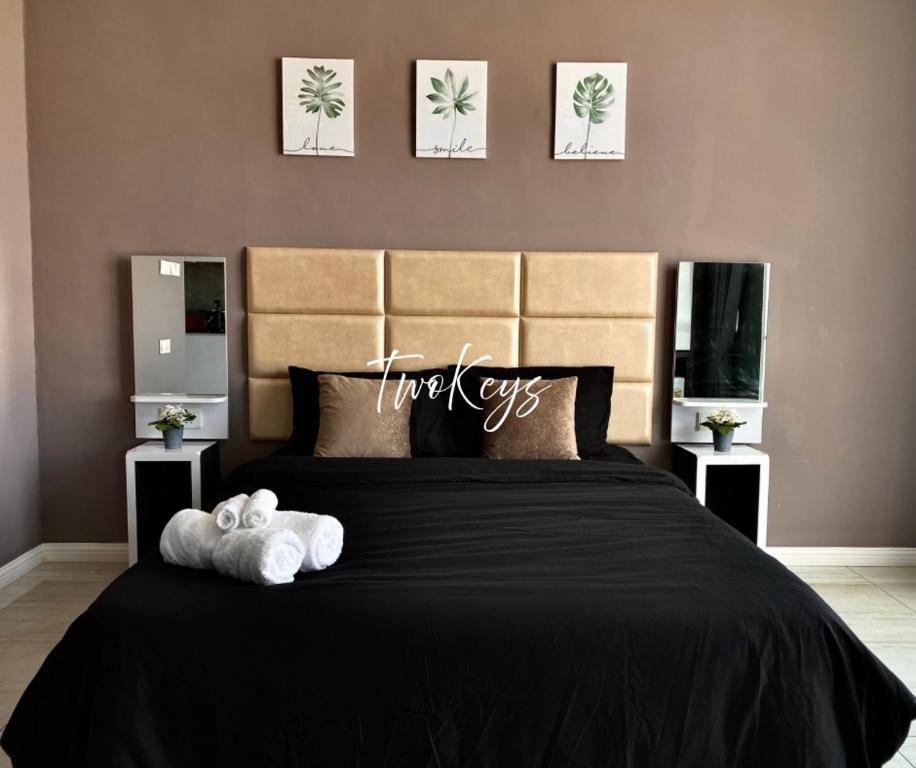 Postel nebo postele na pokoji v ubytování Cozy Soho #2 By TwoKeys