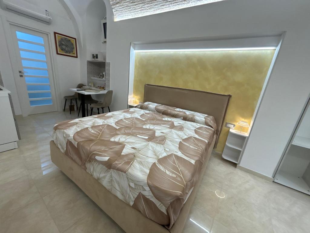 Postel nebo postele na pokoji v ubytování B&B Il Catepano