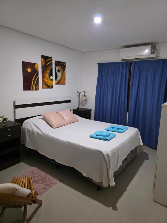 Ένα ή περισσότερα κρεβάτια σε δωμάτιο στο Amanecer Soñado