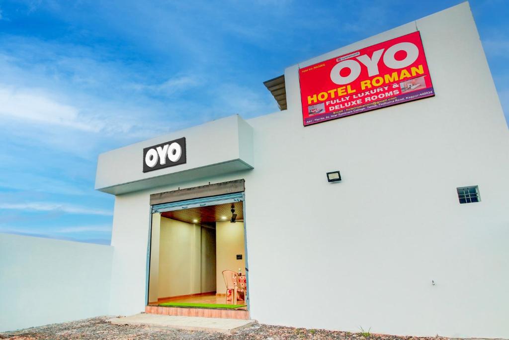 a sign on the side of a hotel room at Hotel O Roman Inn in Nagpur