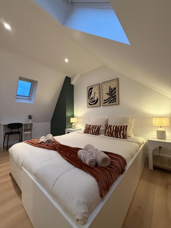 En eller flere senge i et værelse på Casa Verde - T4, Proche plage