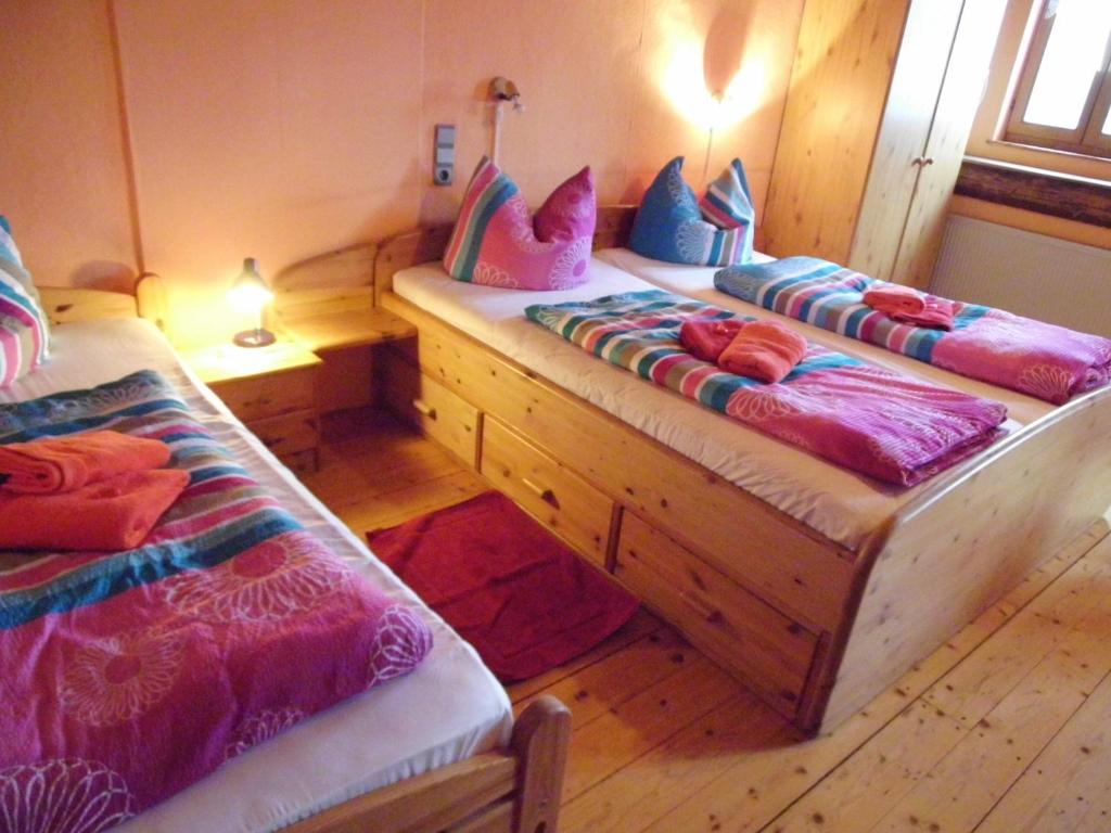 Postel nebo postele na pokoji v ubytování Gästehaus Auhagen
