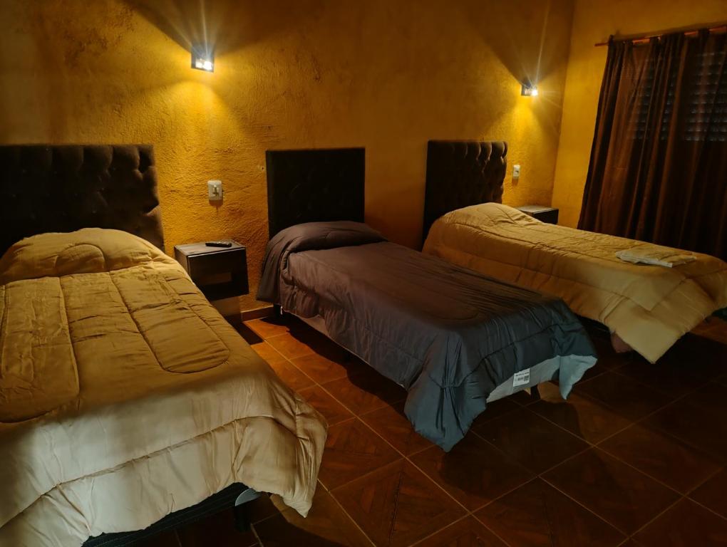 Postel nebo postele na pokoji v ubytování El Molle City