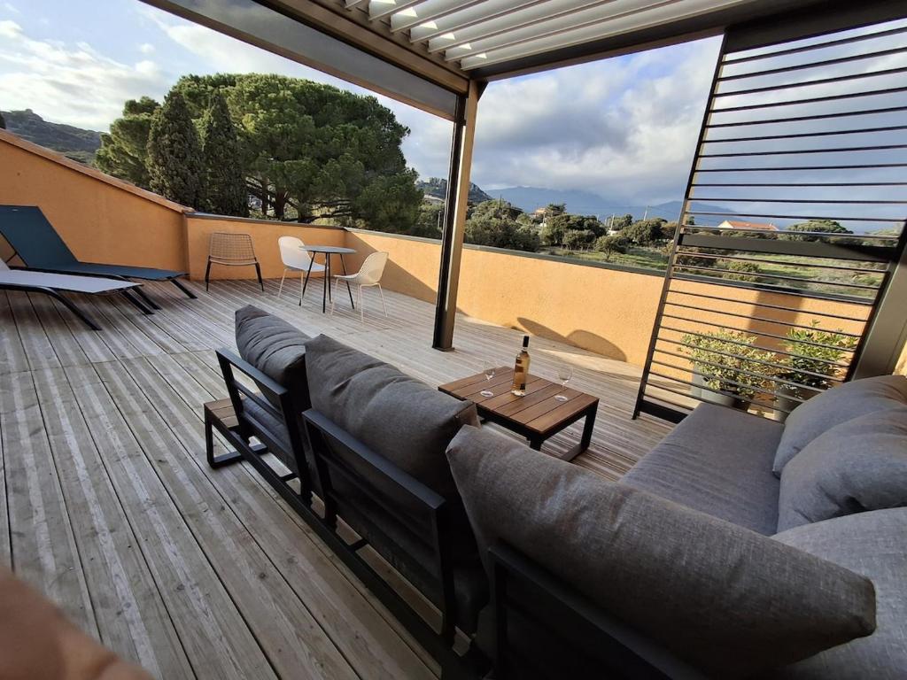 Et opholdsområde på T2 cozy terrasse 40 m2 et pergola