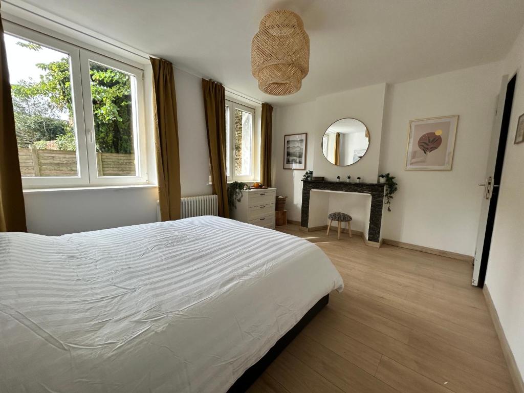 Ένα ή περισσότερα κρεβάτια σε δωμάτιο στο Zen & Yoga - Downtown - Free Parking - 2 beds