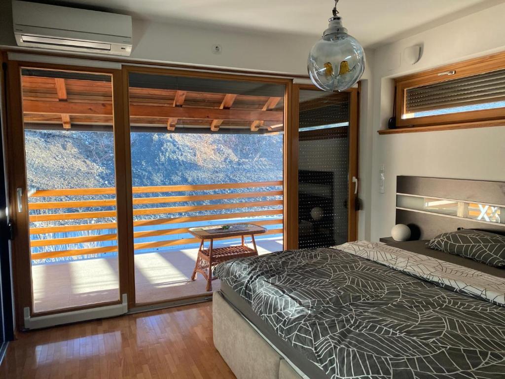 Ένα ή περισσότερα κρεβάτια σε δωμάτιο στο Ella