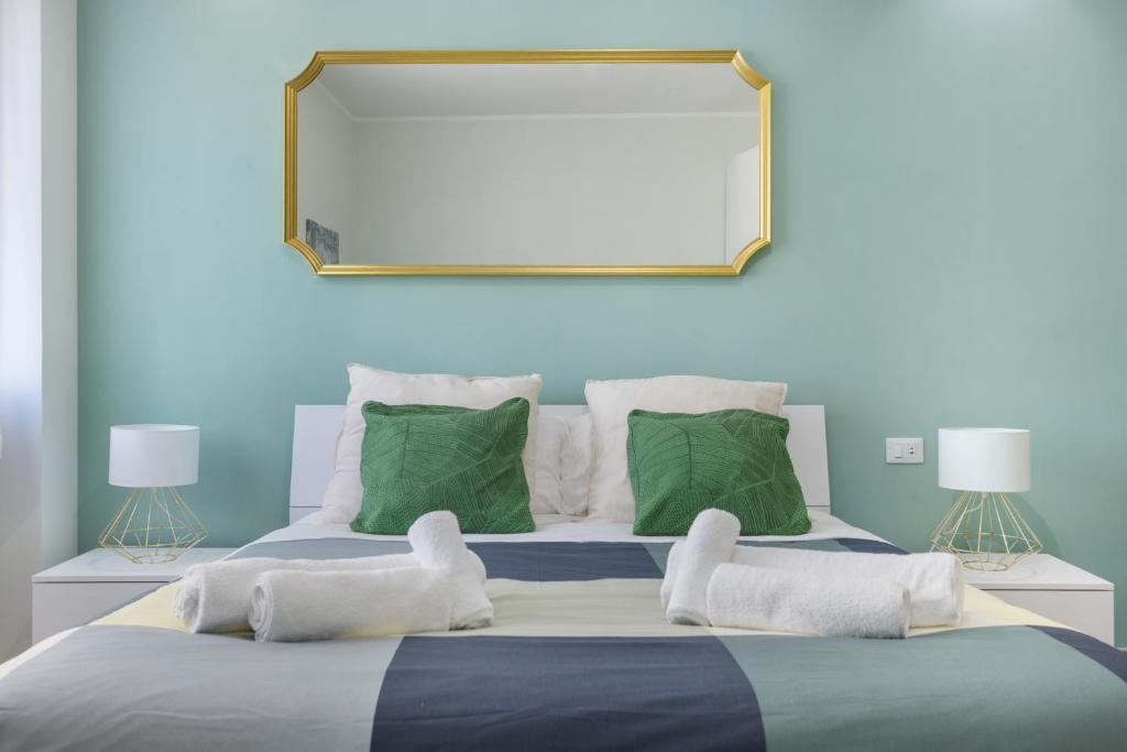 Postel nebo postele na pokoji v ubytování Conca D'Oro Guest House - Elisabetta