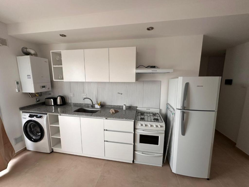 Kuchyň nebo kuchyňský kout v ubytování urbano