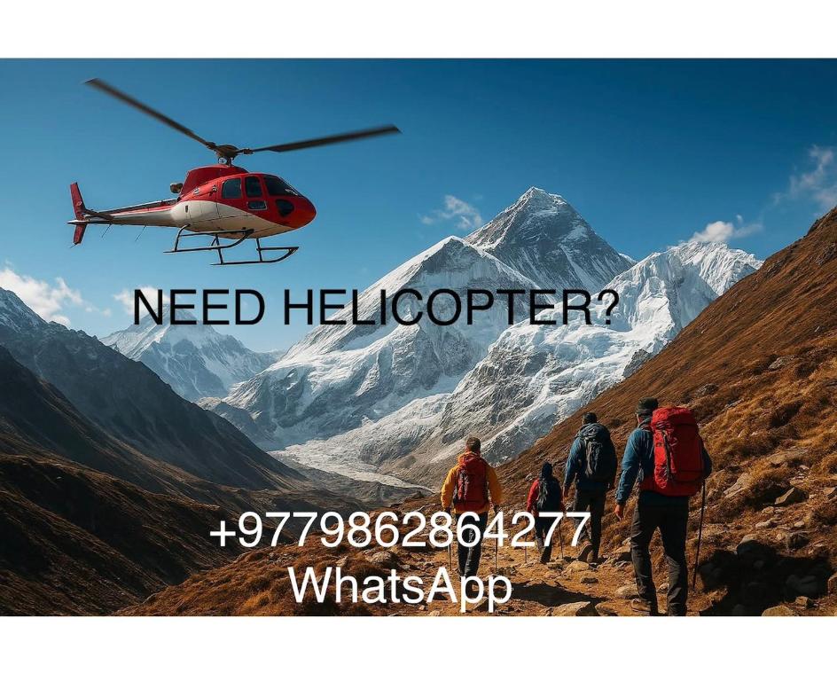Um helicóptero vermelho está sobrevoando uma montanha. em Heli Services Nepal em Chaunrikharka