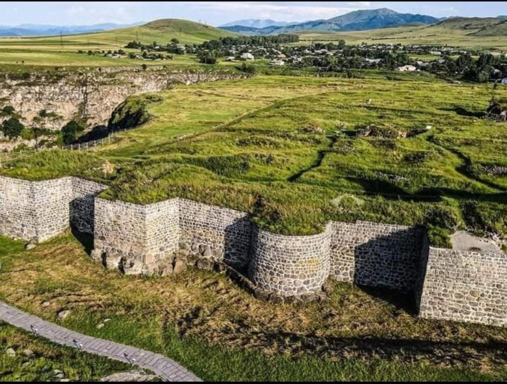an aerial view of a castle in a field at Cottages Lori Berd in Lori Berd