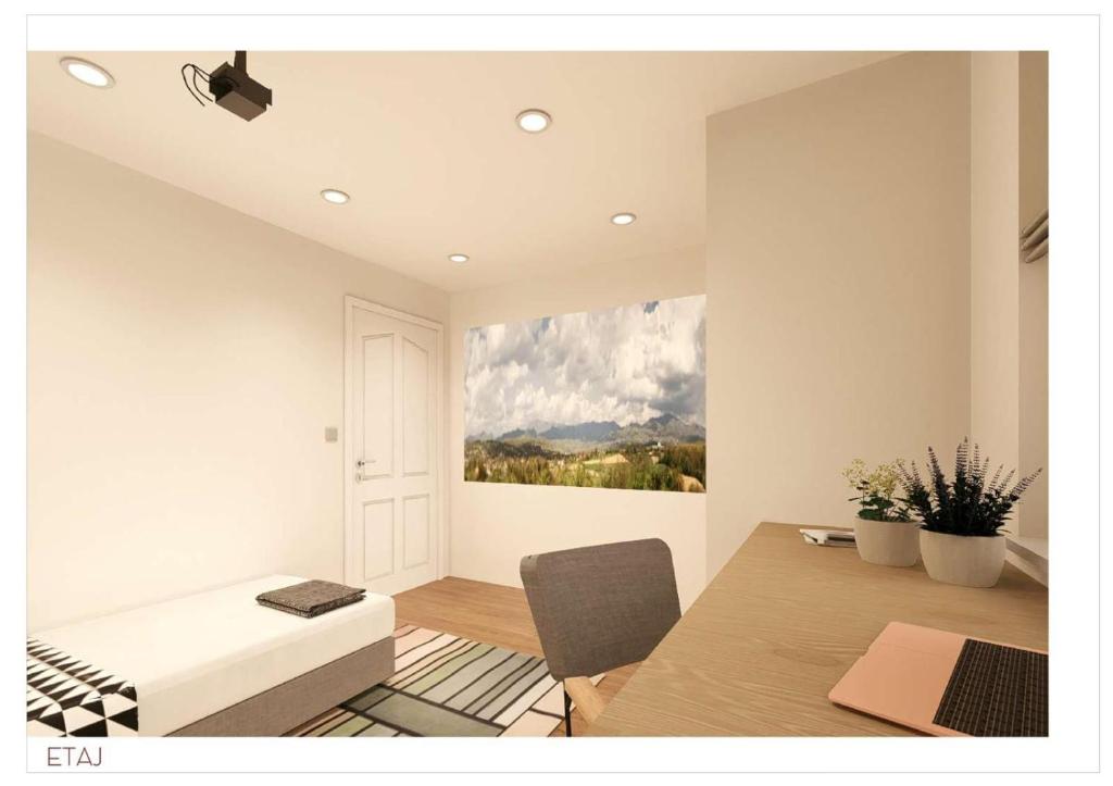 un soggiorno con un dipinto sul muro di Villa Prestige Collection a Scheia