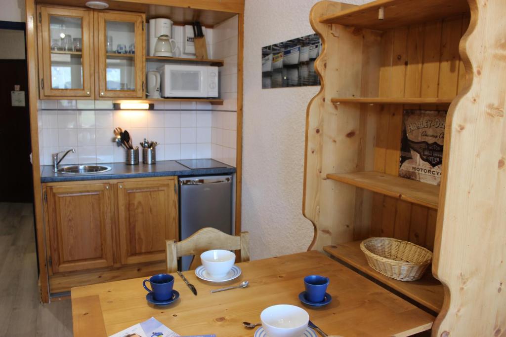 Kuchyň nebo kuchyňský kout v ubytování Hauts De Vanoise Appartements VTI