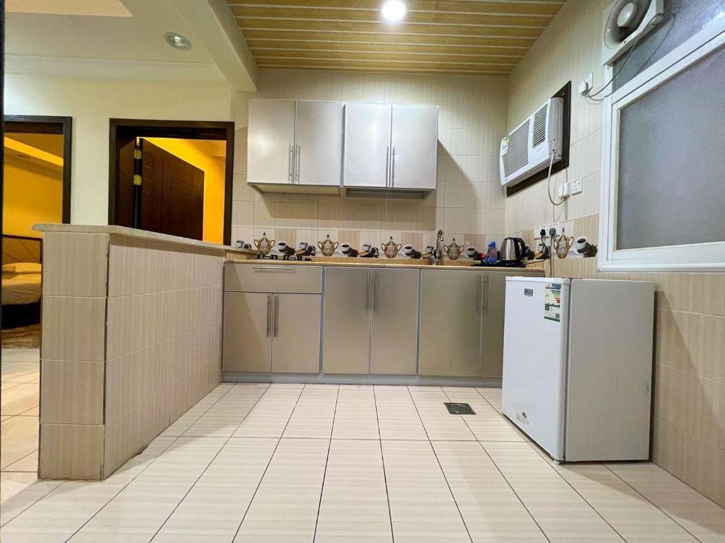 Η κουζίνα ή μικρή κουζίνα στο Malfa SERVICED APARTMENTS