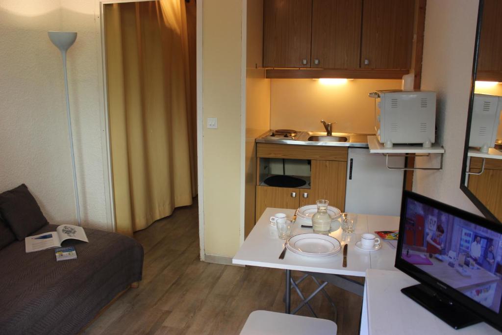Kuchyň nebo kuchyňský kout v ubytování Hauts De Vanoise Appartements VTI