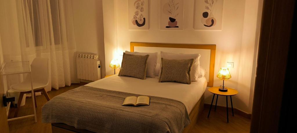 Postel nebo postele na pokoji v ubytování Hotel Arias