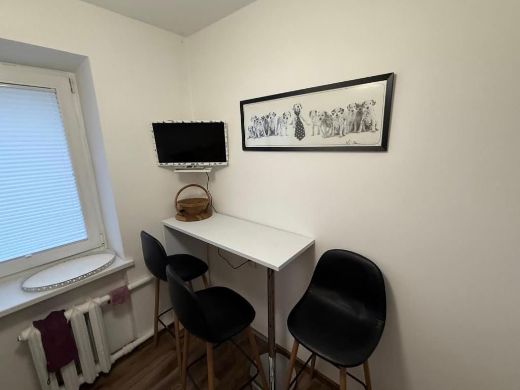 Μια τηλεόραση ή/και κέντρο ψυχαγωγίας στο Lomanosav Cozy Apartametn