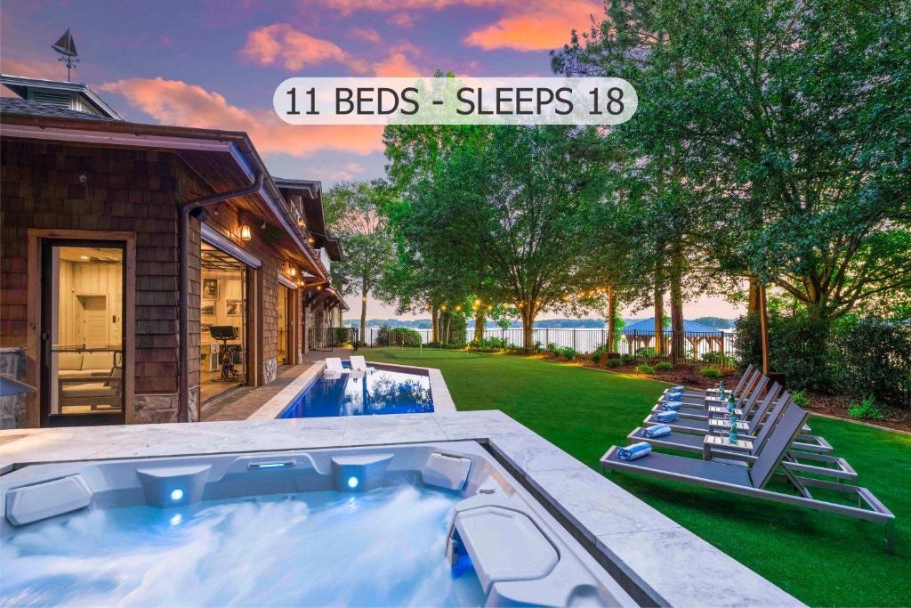 a house with a swimming pool in a yard at The Chasestone in Mooresville