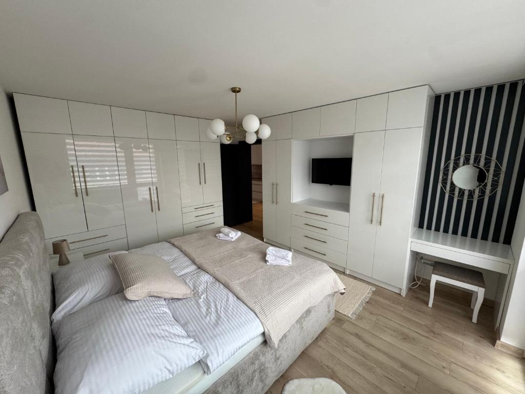 Ένα ή περισσότερα κρεβάτια σε δωμάτιο στο Apartmán Aura