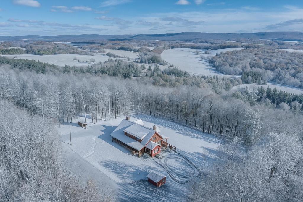 an aerial view of a house in the snow at Oakland Bear Lair in Oakland