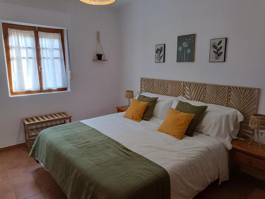 Postel nebo postele na pokoji v ubytování Casa Caldereta