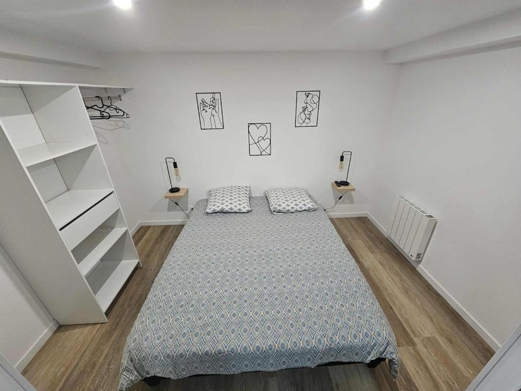 Ένα ή περισσότερα κρεβάτια σε δωμάτιο στο Apartment