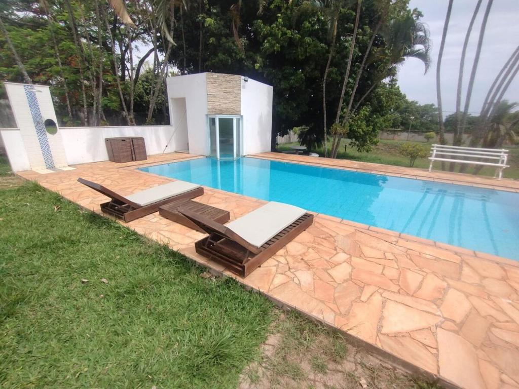 Bazén v ubytování Chácara Mirante do Sol nebo v jeho okolí