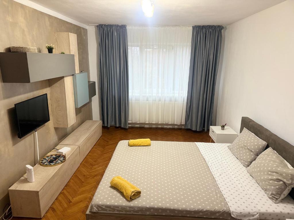 TV/trung tâm giải trí tại Apartament central Bella 7