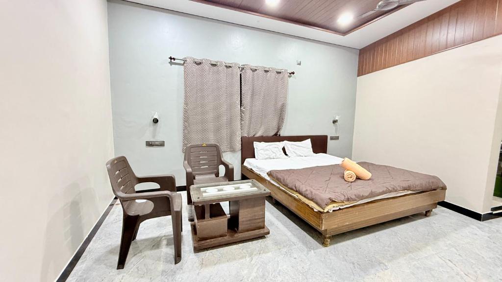 Postel nebo postele na pokoji v ubytování Swara Homestay