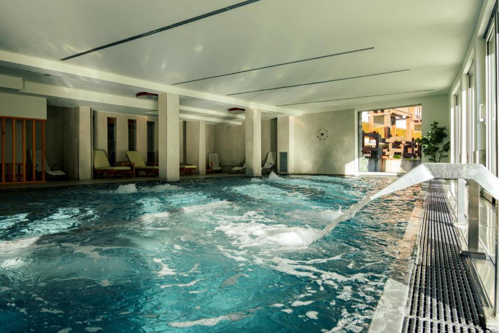 Bazén v ubytování Maison Poluc - Etoile De Neige nebo v jeho okolí