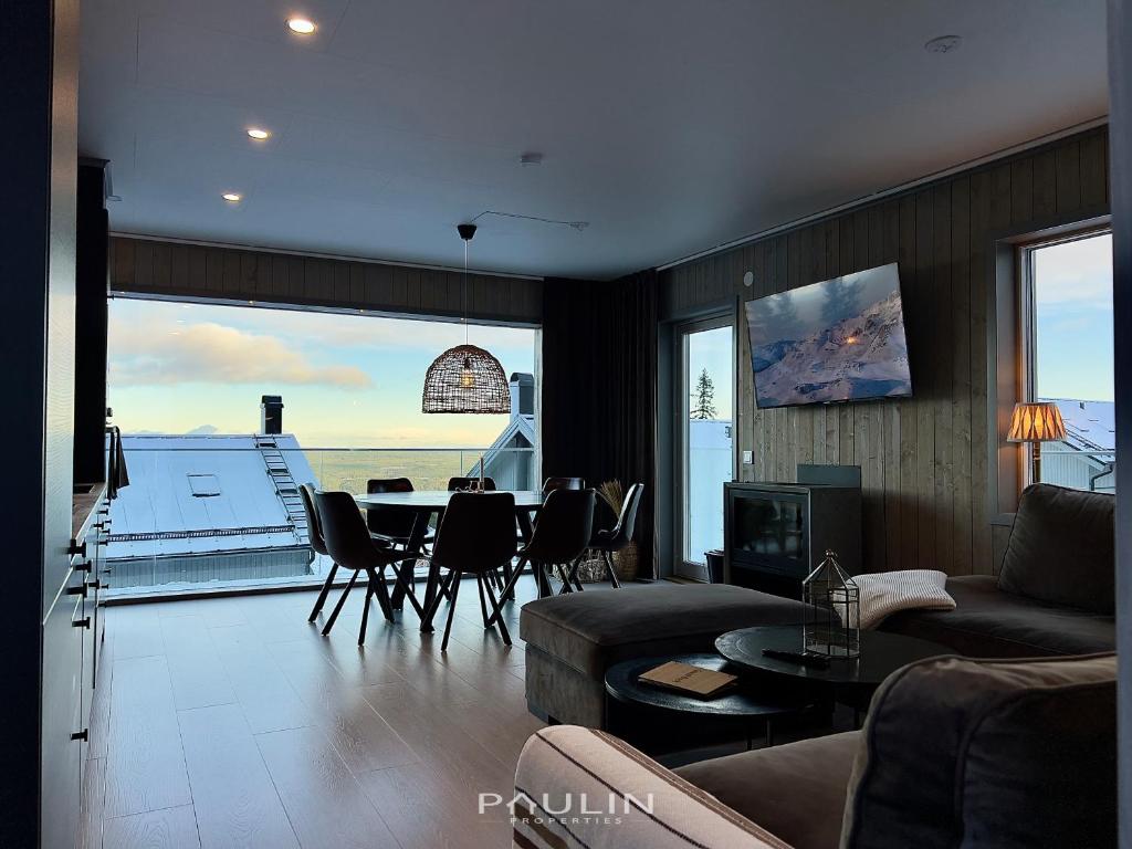 Posezení v ubytování Lindvallen Ski Resort - Sauna - 10 Guests