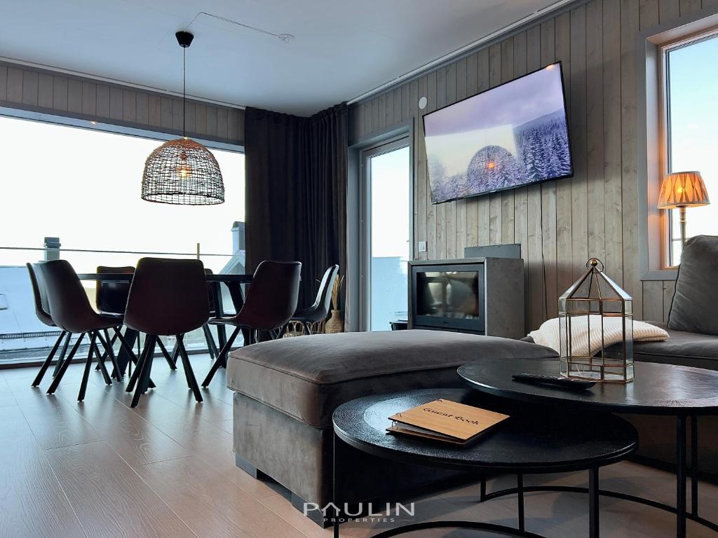 TV a/nebo společenská místnost v ubytování Lindvallen Ski Resort - Sauna - 10 Guests