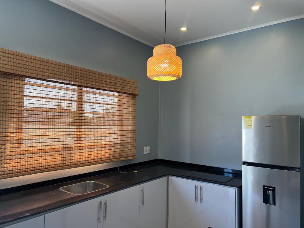 Køkken eller tekøkken på ELY's Modern Apartments