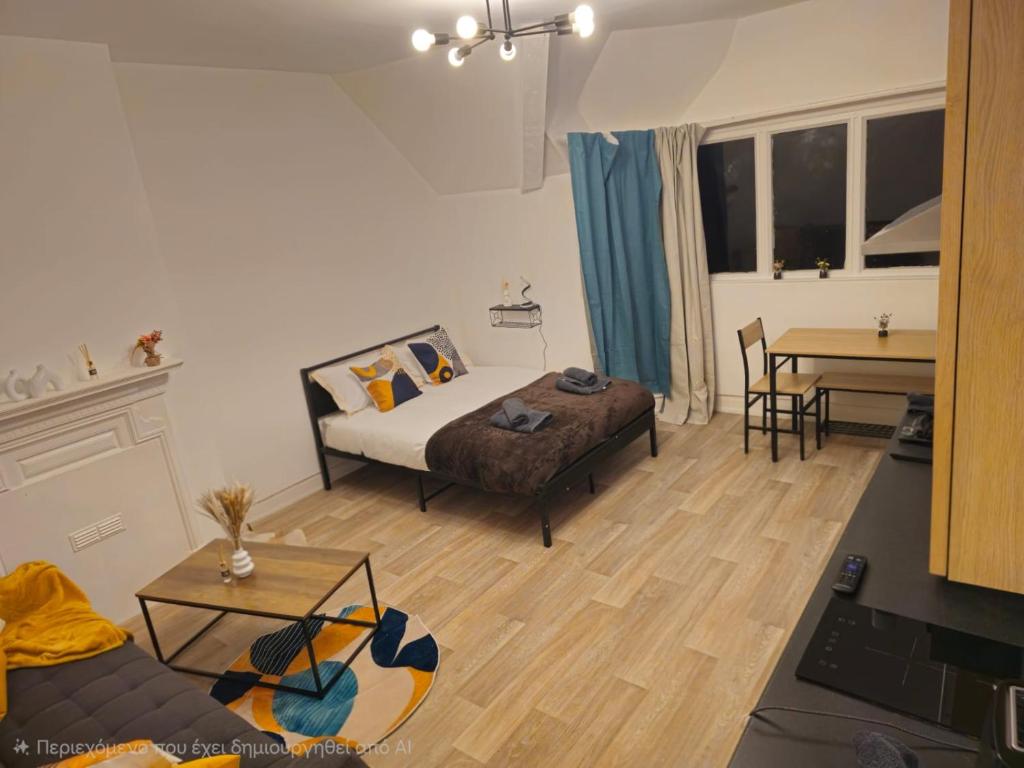 a living room with a couch and a table at Story Haus apartments in Chester