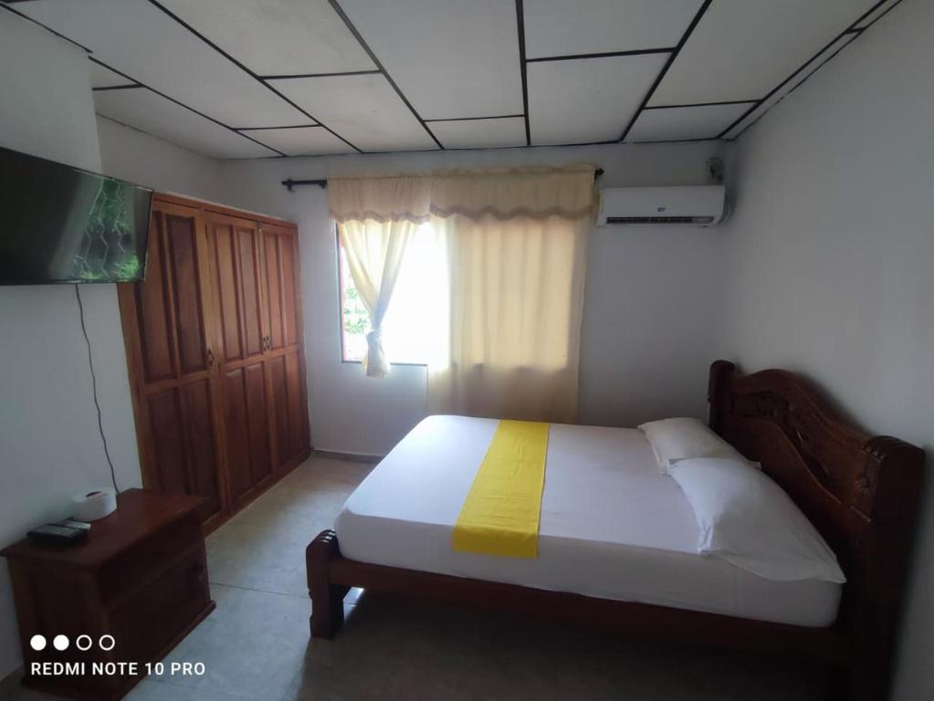 Ένα ή περισσότερα κρεβάτια σε δωμάτιο στο Hotel casa jeniferspa