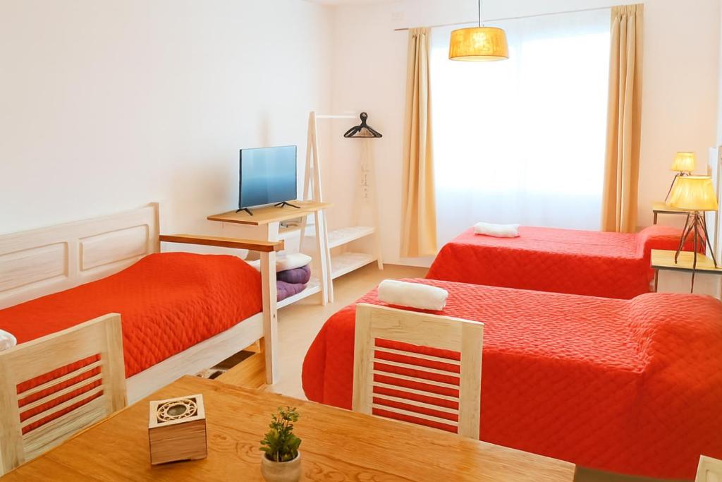 TV a/nebo společenská místnost v ubytování Apart jujuy Suite Premium