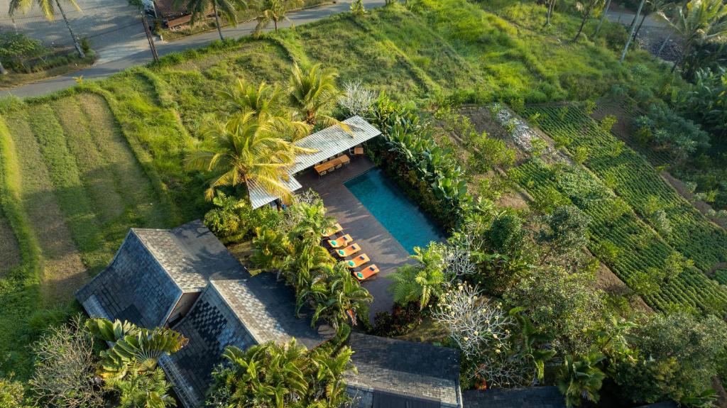 Bazén v ubytování Villa Tegal Tis Ubud nebo v jeho okolí