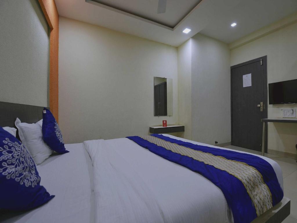 En eller flere senge i et værelse på Hotel O SVL